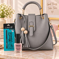 Elegant Grey Women’s Handbag with Gold-Tone Buckle & Tassel Detail