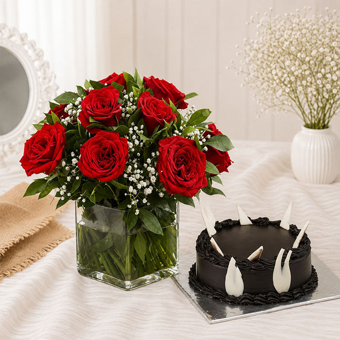 Vase Of Red Roses And Chocolate Cake