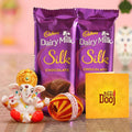 Bhai Dooj Gift Set for Brother with Dairy Milk Silk Chocolates Mini Ganesha Idol Statue Greeting Card and Kalawa Moli Roli Chawal Tika Hamper