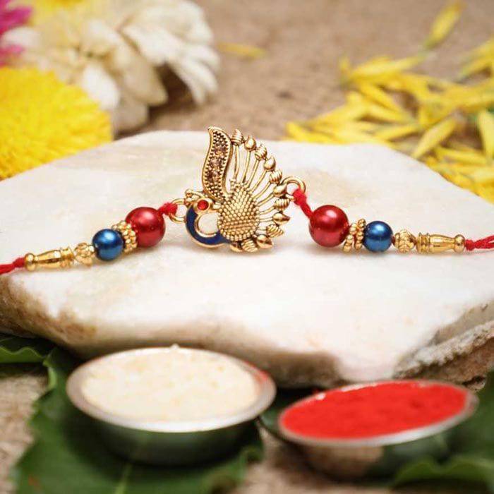 Designer Peocock Rakhi With Roli Pack